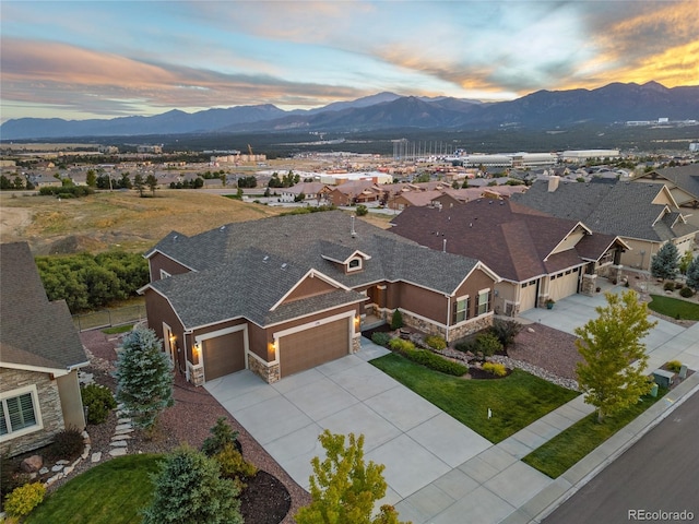 aerial view at dusk with a mountain view