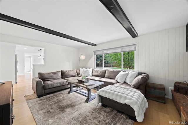 8035 S Garfield Way, Centennial, CO 80122 - living area with beamed ceiling, light wood finished floors, and wood walls