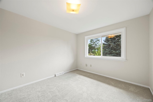 8035 S Garfield Way, Centennial, CO 80122 - carpeted spare room featuring baseboards