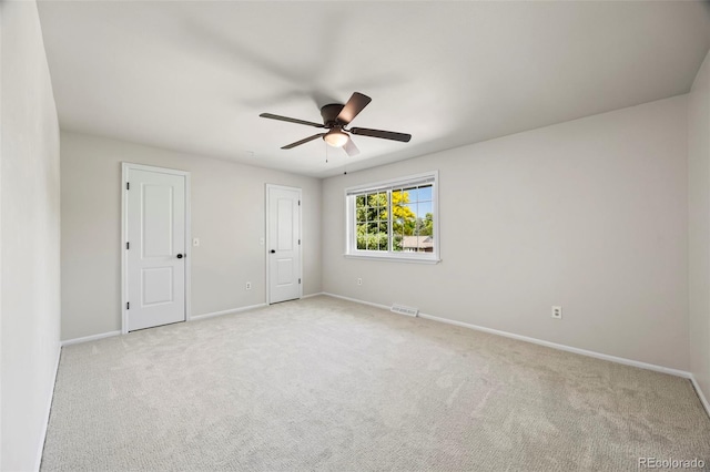 8035 S Garfield Way, Centennial, CO 80122 - unfurnished bedroom featuring light colored carpet, baseboards, and ceiling fan