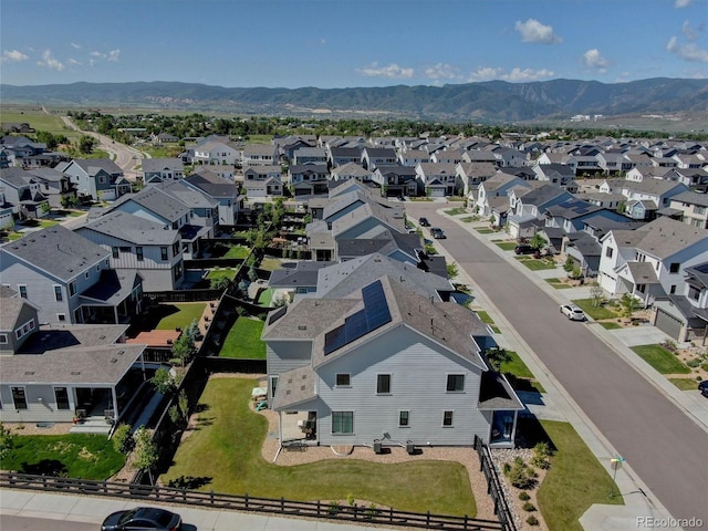 11246 Bellsong Ln, Littleton, CO 80125 - aerial view of property's location with nearby suburban area and a mountainous background