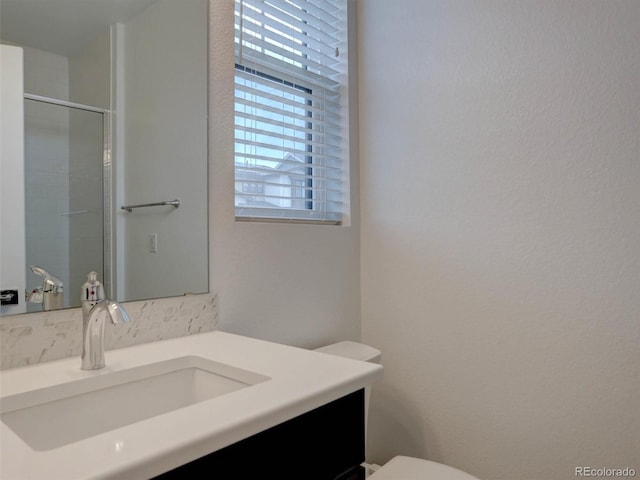 11246 Bellsong Ln, Littleton, CO 80125 - full bathroom featuring vanity and a tile shower