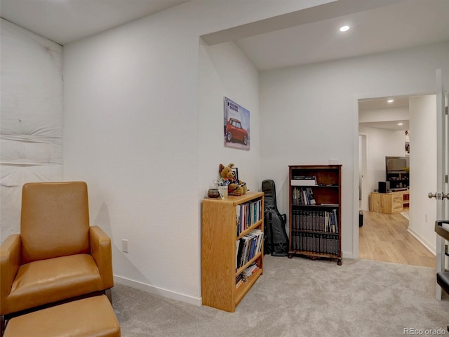 11246 Bellsong Ln, Littleton, CO 80125 - living area featuring carpet and recessed lighting