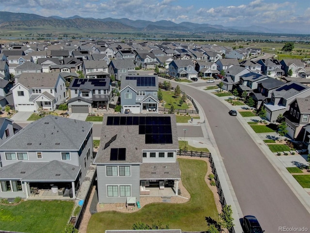 11246 Bellsong Ln, Littleton, CO 80125 - aerial view of residential area with a mountainous background