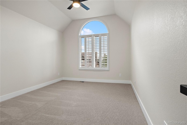 10 Summit Ash, Littleton, CO 80127 - unfurnished room with ceiling fan, carpet flooring, vaulted ceiling, and baseboards