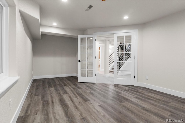 10 Summit Ash, Littleton, CO 80127 - empty room featuring french doors, wood finished floors, recessed lighting, baseboards, and stairs