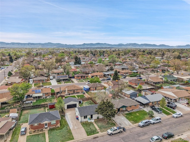 drone / aerial view with a mountain view and a residential view
