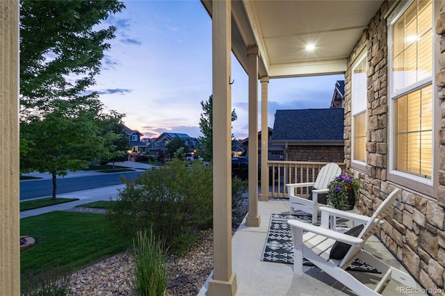 6236 S Millbrook Way, Aurora, CO 80016 - patio terrace at dusk with a porch