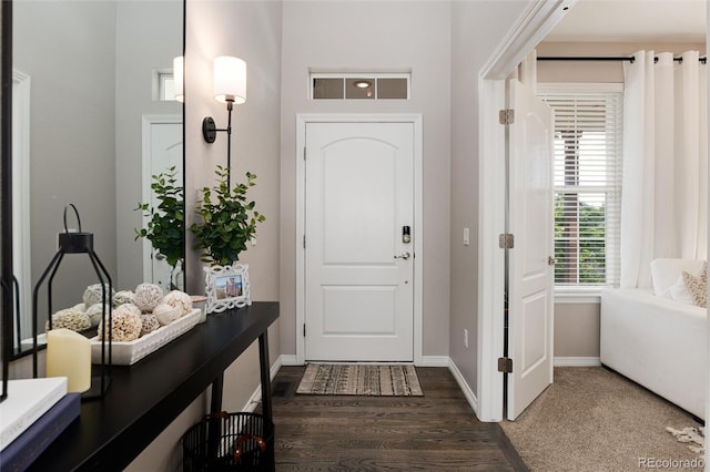 6236 S Millbrook Way, Aurora, CO 80016 - foyer entrance featuring dark wood-style floors and baseboards