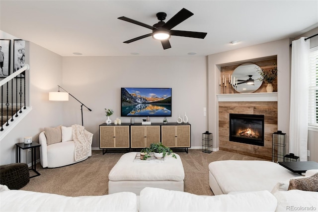 6236 S Millbrook Way, Aurora, CO 80016 - living area featuring carpet, ceiling fan, a fireplace, and stairway
