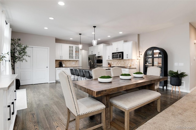 6236 S Millbrook Way, Aurora, CO 80016 - dining space featuring recessed lighting and dark wood finished floors