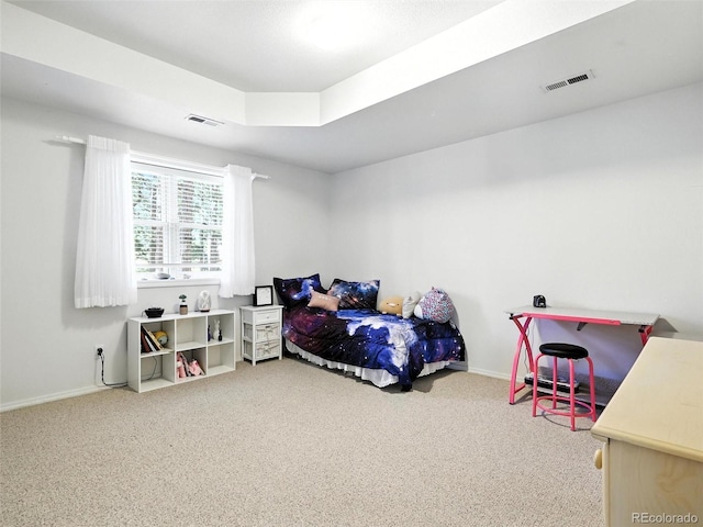 bedroom featuring carpet floors and baseboards
