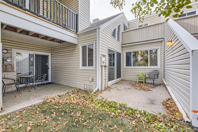 exterior space with a patio and a balcony