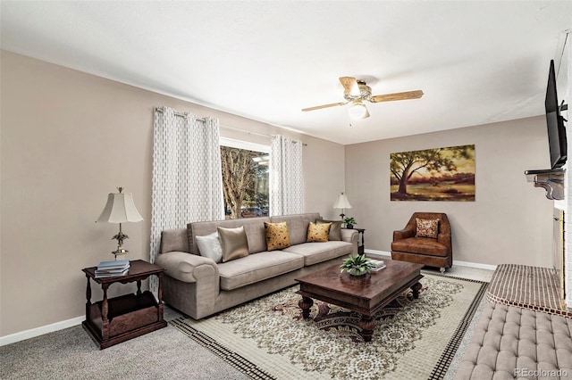 living room featuring ceiling fan and light colored carpet