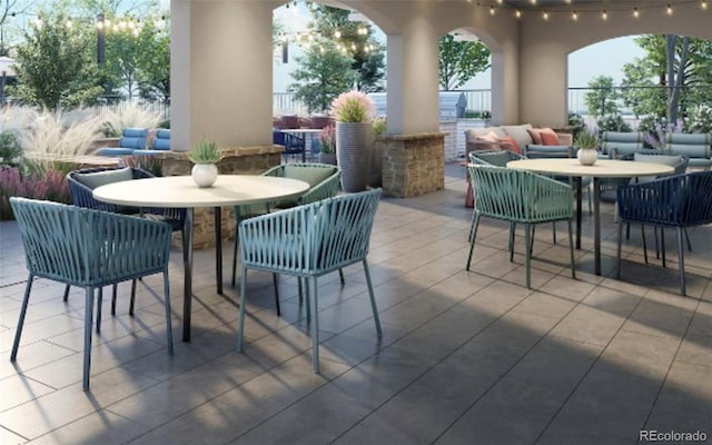 view of patio with an outdoor hangout area and outdoor dining space