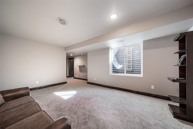 unfurnished living room with light carpet