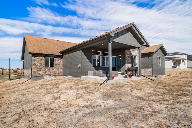 back of house featuring a patio area