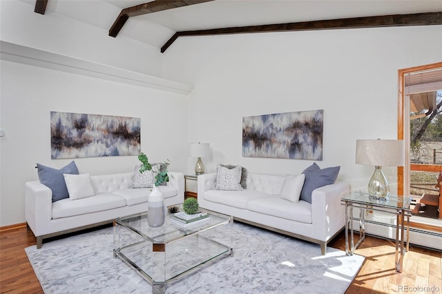 living room with lofted ceiling with beams, baseboard heating, and wood finished floors