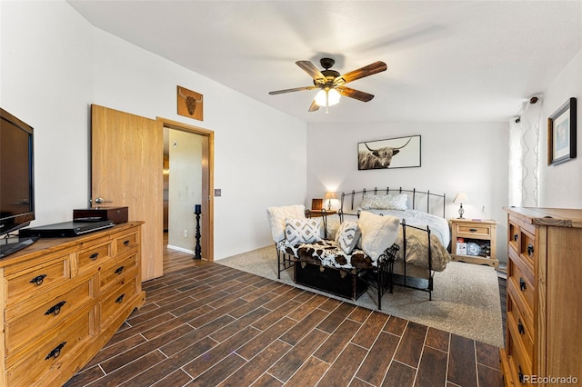 bedroom with ceiling fan and lofted ceiling