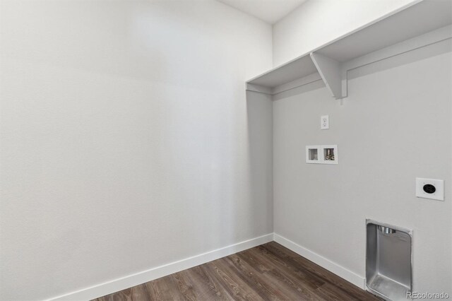 clothes washing area with washer hookup, electric dryer hookup, and dark wood-type flooring