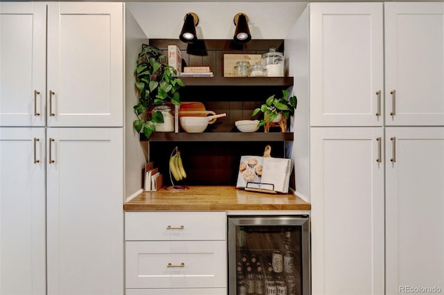 bar featuring white cabinetry and wine cooler