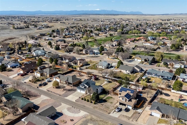 aerial view featuring a mountain view and a residential view