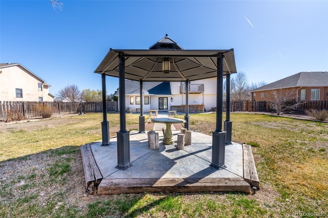 view of patio / terrace with a fenced backyard and a gazebo