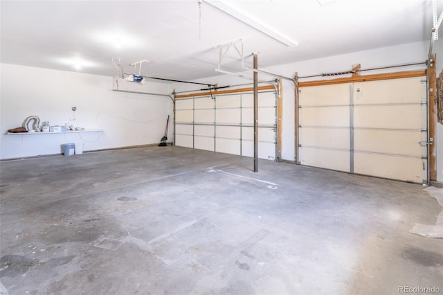 garage featuring a garage door opener