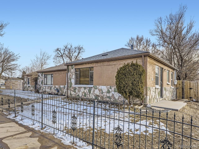 view of snow covered property