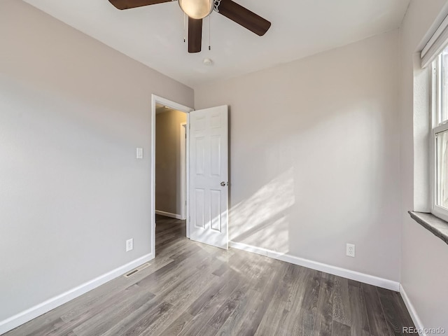 spare room featuring hardwood / wood-style floors