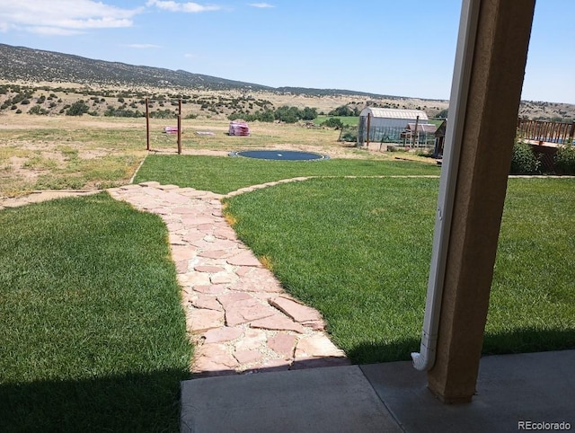 view of yard with a mountain view