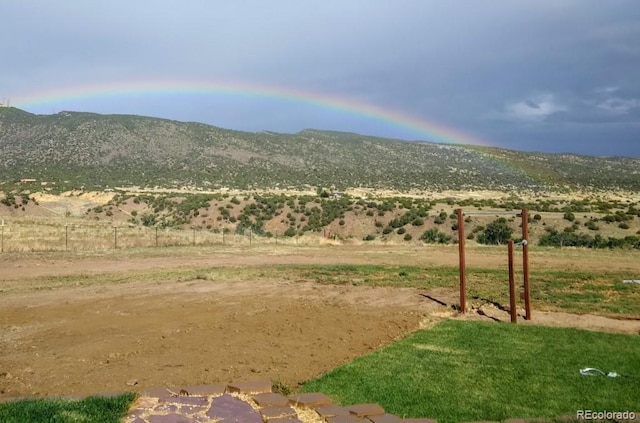 mountain view featuring a rural view