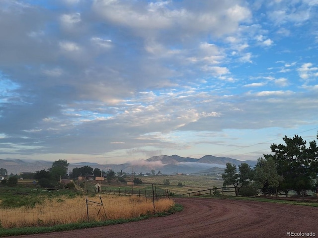 property view of mountains featuring a rural view