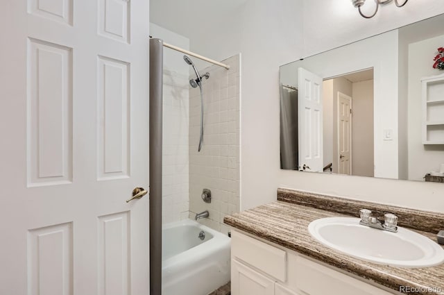 full bath featuring vanity and shower / bath combination