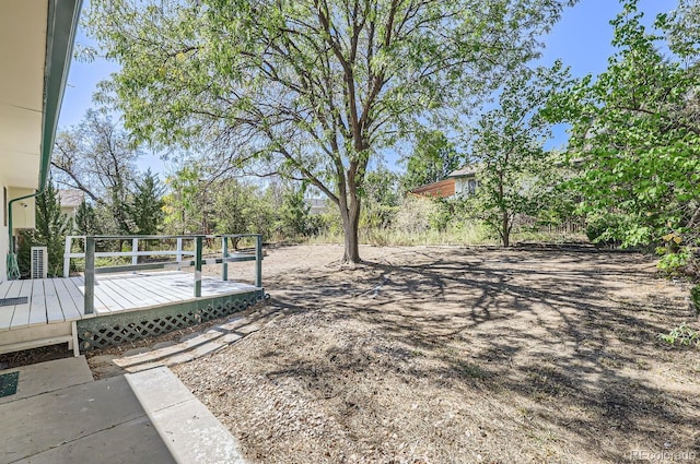 view of yard with a deck