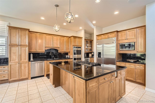kitchen featuring a sink, built in appliances, light tile patterned floors, and backsplash