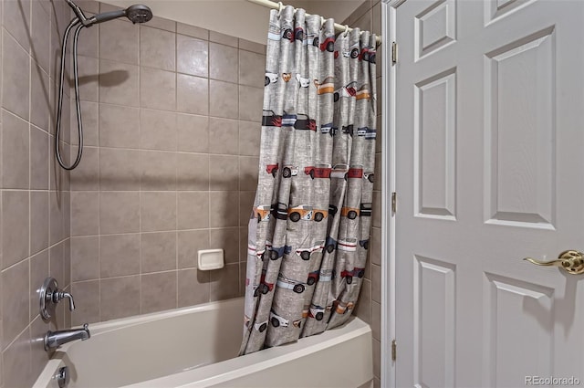 bathroom with shower / bath combo