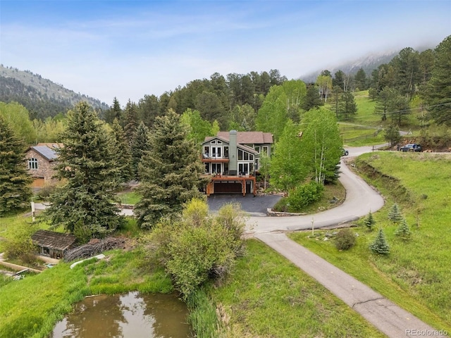 4230 S Meadow Brook Ln, Evergreen, CO 80439 - aerial view of property and surrounding area featuring a forest