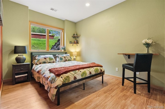4230 S Meadow Brook Ln, Evergreen, CO 80439 - bedroom featuring light wood-style floors, baseboards, and recessed lighting