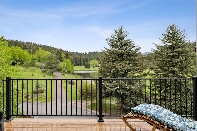 4230 S Meadow Brook Ln, Evergreen, CO 80439 - balcony with a wooded view and a water view