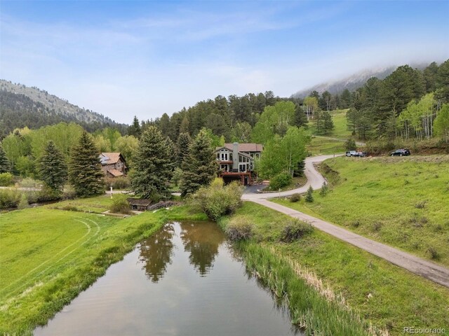 4230 S Meadow Brook Ln, Evergreen, CO 80439 - view of subject property with a large body of water and a forest