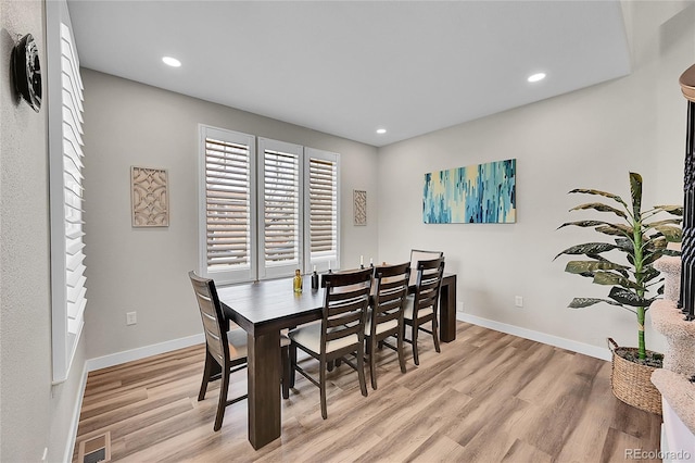 dining room featuring light hardwood / wood-style floors