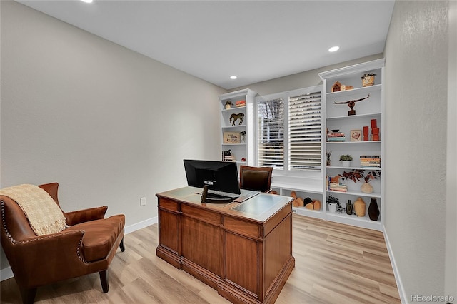 home office featuring light hardwood / wood-style flooring