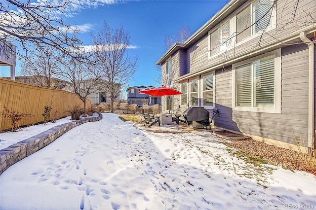 view of yard covered in snow