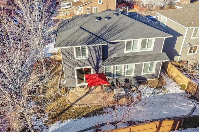 rear view of property featuring a patio area