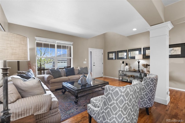 1852 E Sea Drift Dr, Windsor, CO 80550 - living room with ornate columns, wood finished floors, and recessed lighting
