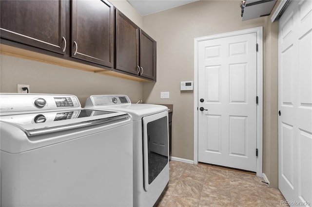1852 E Sea Drift Dr, Windsor, CO 80550 - washroom with washing machine and dryer and cabinet space