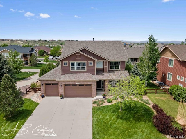 1852 E Sea Drift Dr, Windsor, CO 80550 - view of front of house featuring concrete driveway, a shingled roof, a garage, a residential view, and brick siding