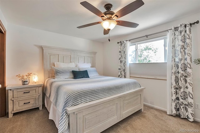 8262 Otis Ct, Arvada, CO 80003 - bedroom with light colored carpet and a ceiling fan