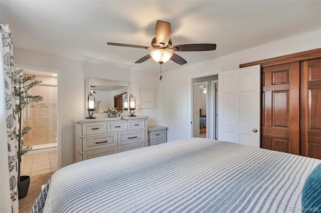 8262 Otis Ct, Arvada, CO 80003 - tiled bedroom featuring a closet, ceiling fan, and ensuite bathroom